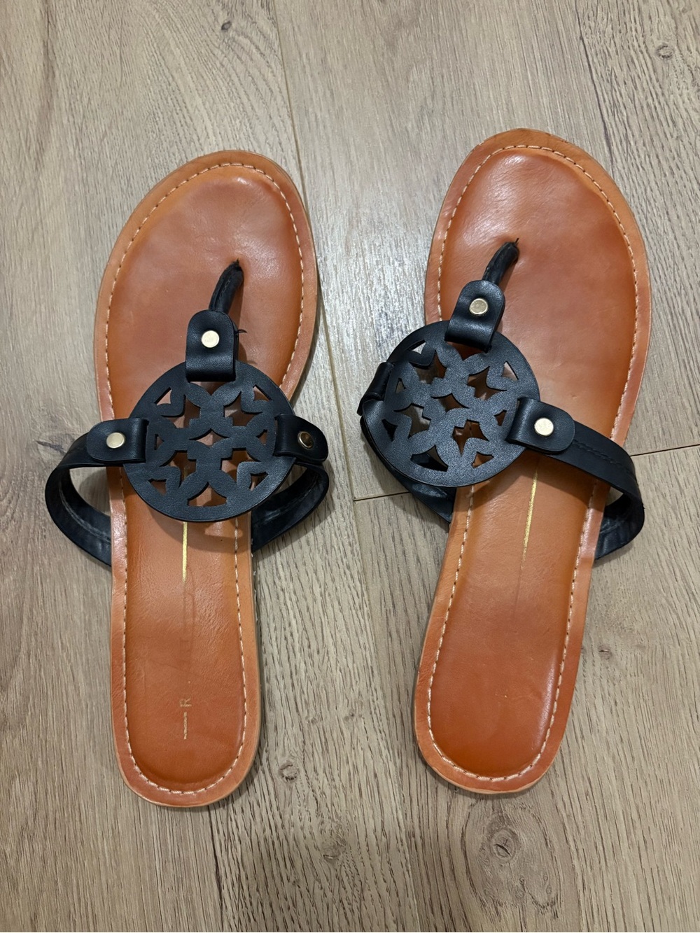 Tory Burch Black Laser-Cut Medallion Toe-Post Sandals with Tan Footbed